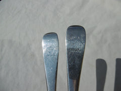1721 fine pair of George 1st Britannia standard three pronged forks with crest and motto