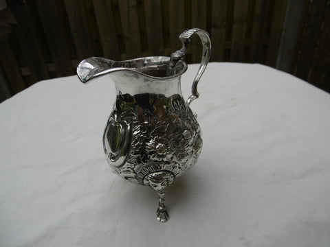 1748 rare Irish George 11 cream jug by maker IE 125g lions head legs