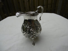 1748 rare Irish George 11 cream jug by maker IE 125g lions head legs