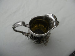 1748 rare Irish George 11 cream jug by maker IE 125g lions head legs