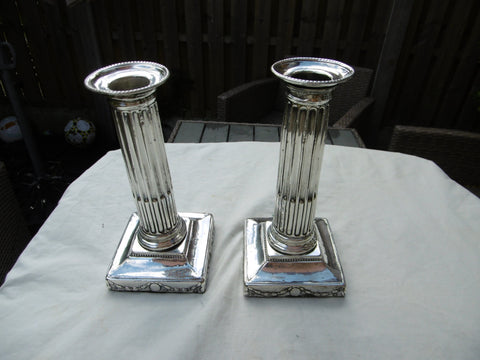 1776 nice pair of George 111 silver candlesticks by IC 17cms high weighted bases