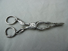 1760 beautiful pair of cast silver naturalistic sugar nips 40g