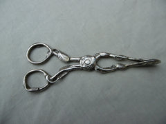 1760 beautiful pair of cast silver naturalistic sugar nips 40g