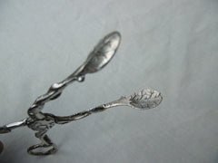 1760 beautiful pair of cast silver naturalistic sugar nips 40g