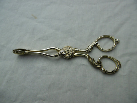 1740 excellent pair of Georgian silver gilt sugar nips by Philip Roker